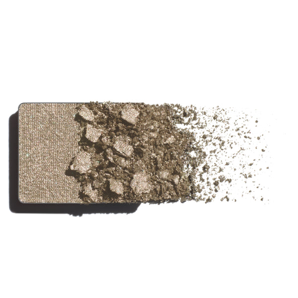 Makeup eyeshadow refill with sage green with silver pearl powder on a white background