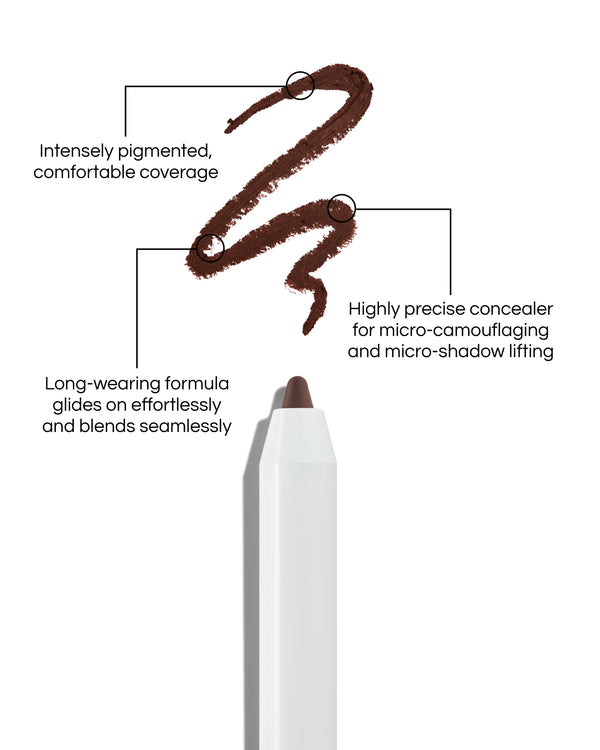Close up of Pinpoint® Concealer with cream pencil tip, shown with a shade swatch, demonstrating the product's tones and texture, with text: Intensely pigmented, comfortable coverage. Long-wearing formular glides on effortlessly and blends seamlessly. Highly precise concealer for micro-camouflaging and micro-shado lifting.