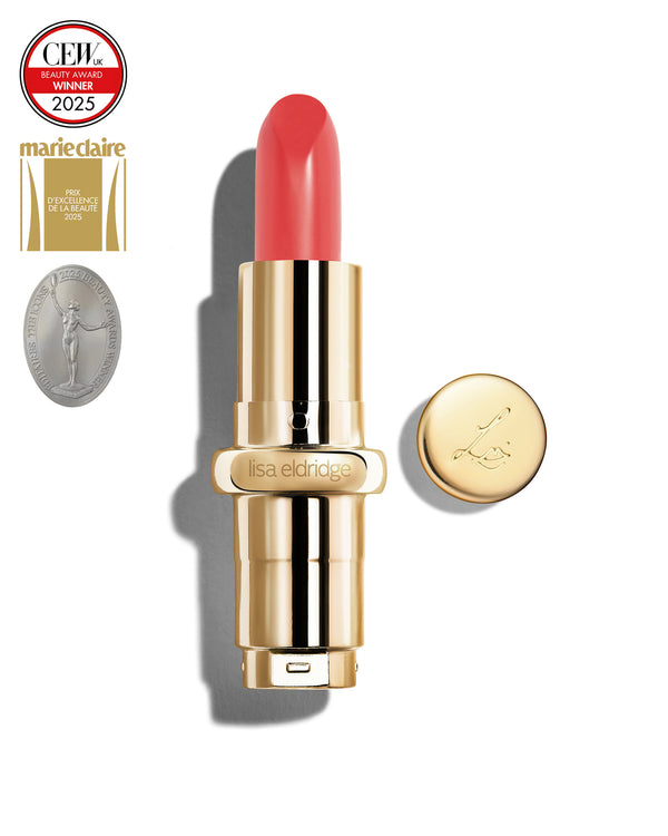 Salmon pink coloured lipstick with gold casing and 'Lisa Eldridge' branding on a white background, featuring a CEW Beauty Award 2025 badge.