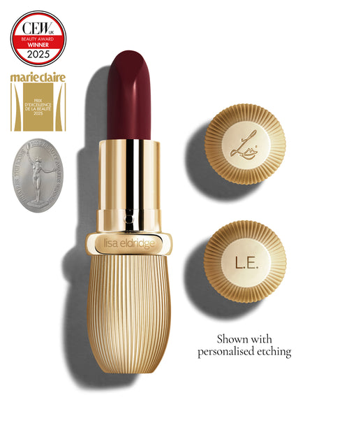 Deep claret coloured lipstick with gold vintage-style casing and 'Lisa Eldridge' branding on a white background, featuring a CEW Beauty Award 2025 badge.