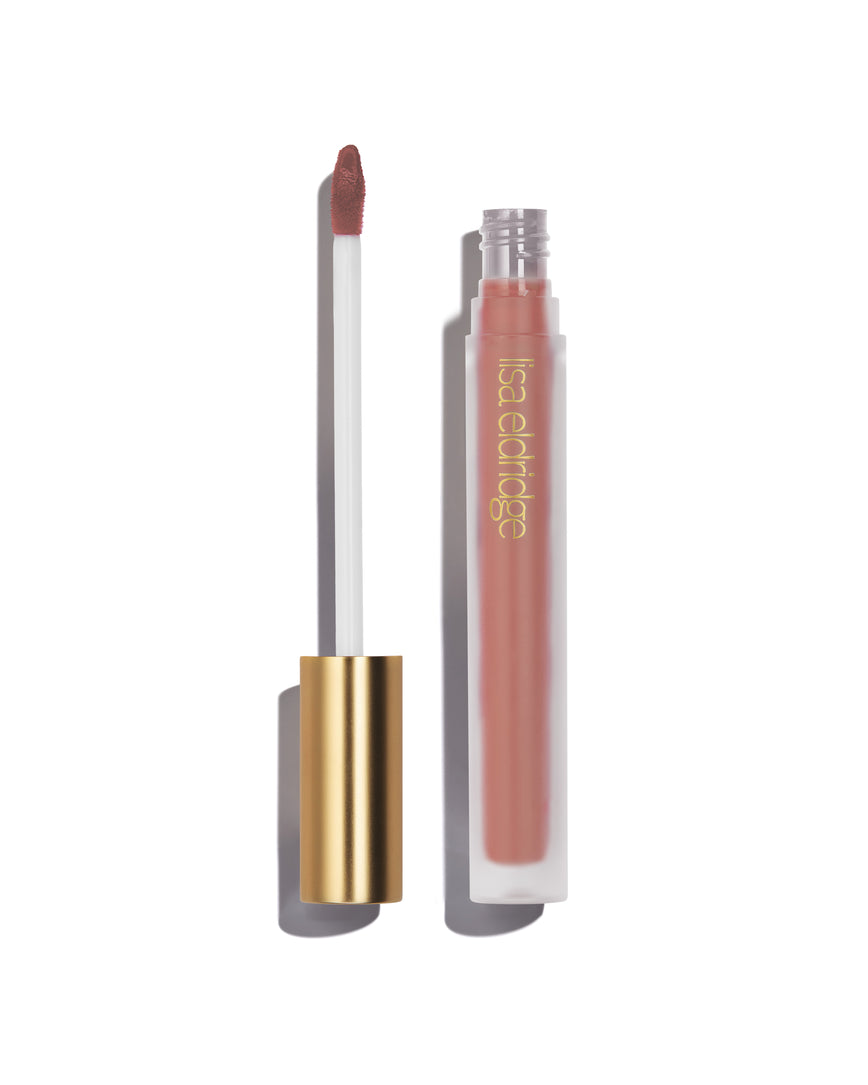 Soft beige Fawn Velveteen Liquid Lip Colour with open gold cap, frosted bottle on a white background, with lisa eldridge branding featuring a CEW Beauty Award Winner 2024 badge.