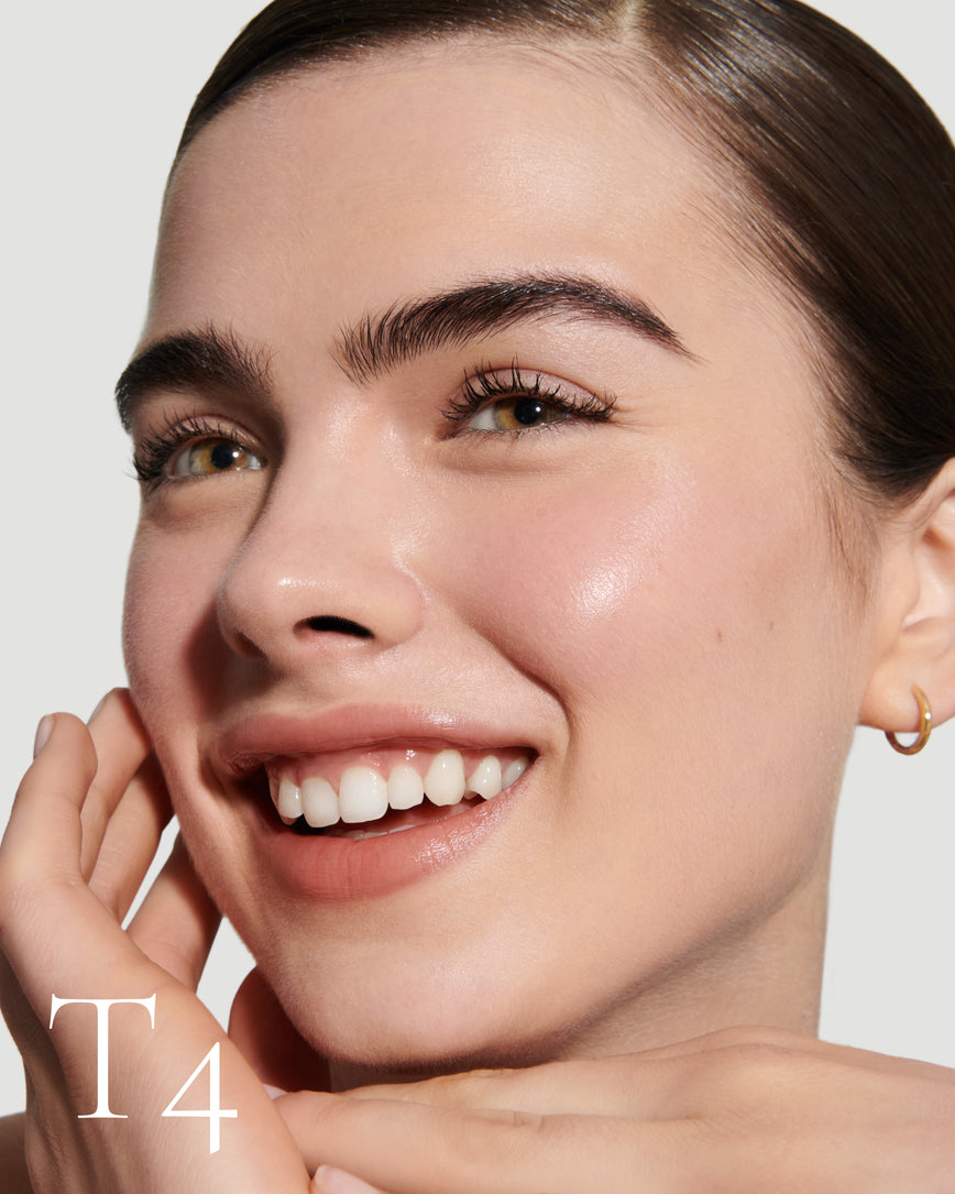 numbered Close up portrait of model wearing T4 with text displaying so