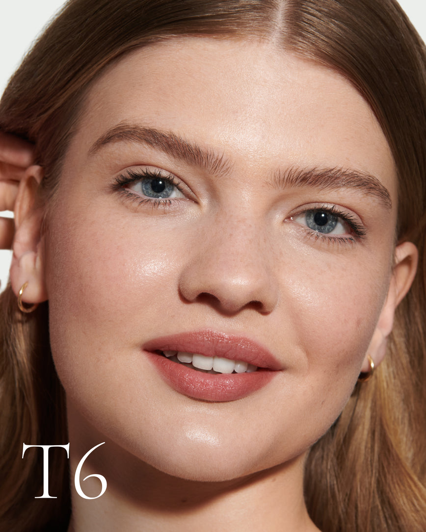 numbered Close up portrait of model wearing T6 with text displaying so