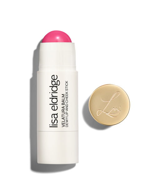 Lisa Eldridge Velatura Balm stick in [SHADE] shade, with cream packaging and golden logo-embossed cap, on a white background