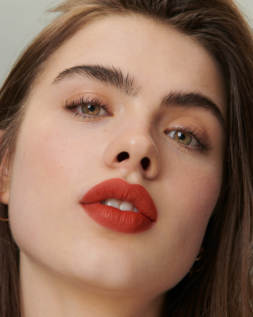 Lisa Eldridge Velveteen Liquid Lip Colour in Shade Dragon on Model