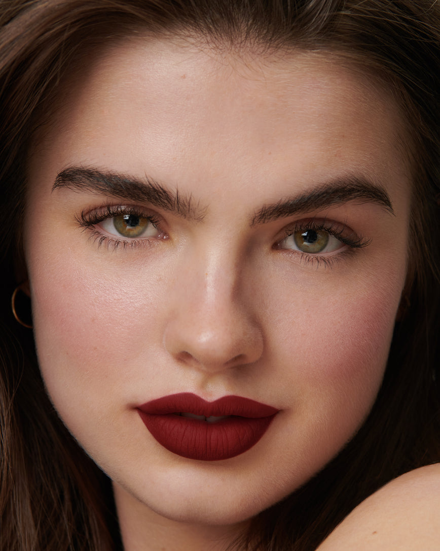 Lisa Eldridge Velveteen Liquid Lip Colour in Shade Jazz on Model