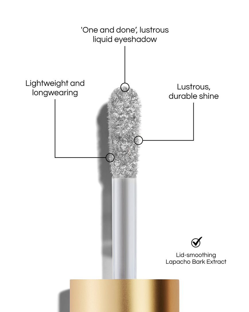 Liquid Lurex Eyeshadow applicator tip with text highlighting features: 'One and done', lustrous liquid eyeshadow. Lightweight and longwearing. Lustrous, durable shine. Lid-smoothing Lapacho Bark Extract. In shade Aria.