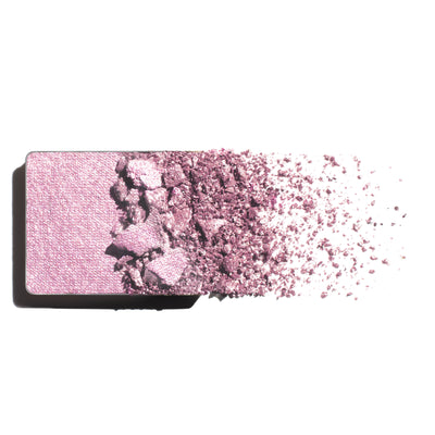 Makeup eyeshadow refill with lilac and pink shimmer powder on a white background