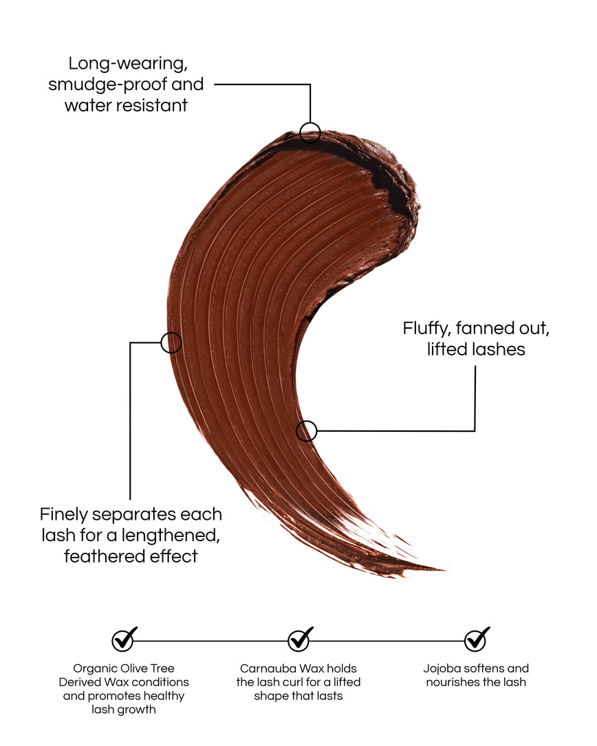 Kitten Lash Mascara swatch in Burnt Umber with descriptive text about the formula: Long-wearing, smudge-proof and water resistant. Fluffy, fanned out, lifted lashes. Finely separates each lash for a lengthened, feathered effect. Organic Olive Tree Derived Wax conditions and promotes healthy lash growth. Carnauba Wax holds the lash curl for a lifted shape that lasts. Jojoba softens and nourishes the lash.