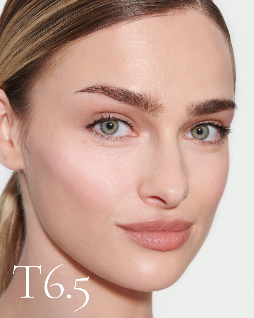 numbered howtouse Close up portrait of model wearing T6.5 with text displaying so