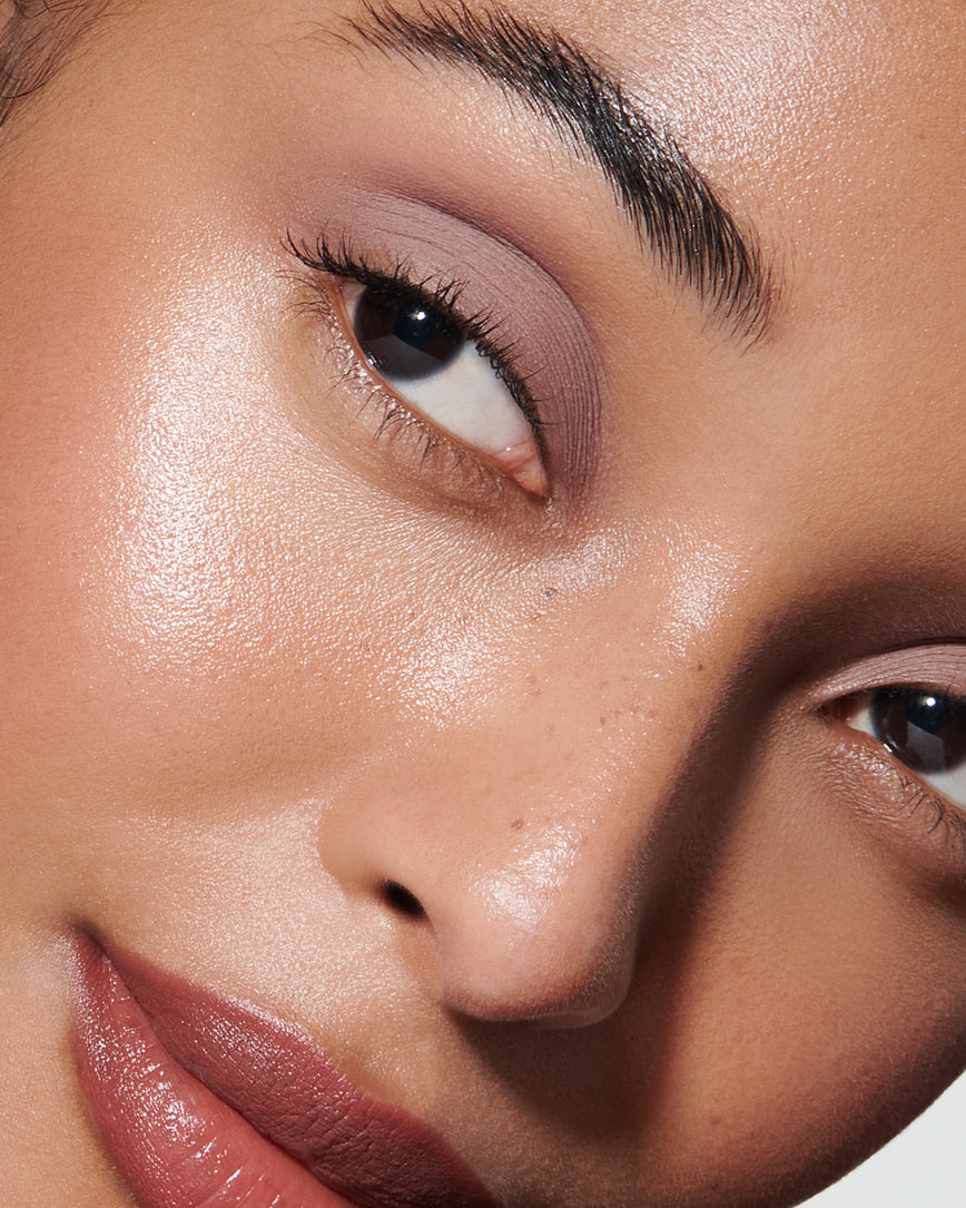 Portrait close-up of model wearing cool mauve Ione Liquid Silk eyeshadow