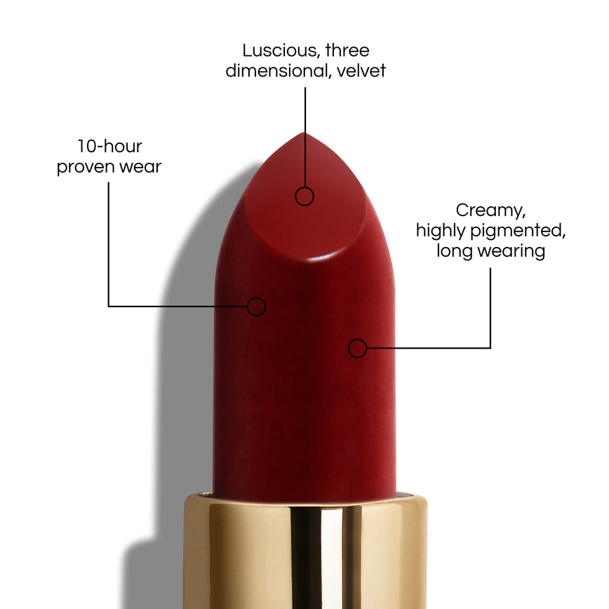 True Velvet Lip Colour bullet close-up, with text demonstrating it's benefits: Lucious, three dimensional, velvet. 10-hour proven wear. Creamy, highly pigmented, long wearing. In shade Jazz.