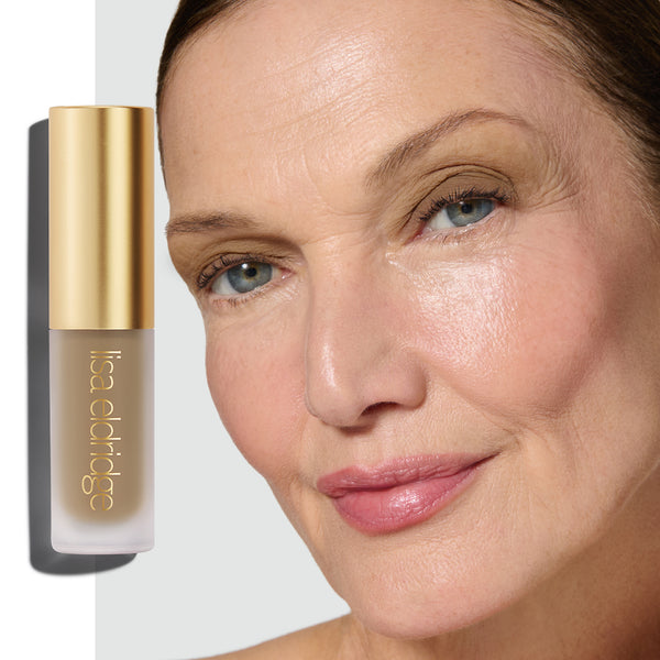 Model wearing Mimi Liquid Silk  Eyeshadow with the product in the foreground on a white background.