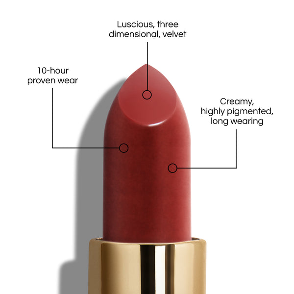 True Velvet Lip Colour bullet close-up, with text demonstrating it's benefits: Lucious, three dimensional, velvet. 10-hour proven wear. Creamy, highly pigmented, long wearing. In shade Rain.