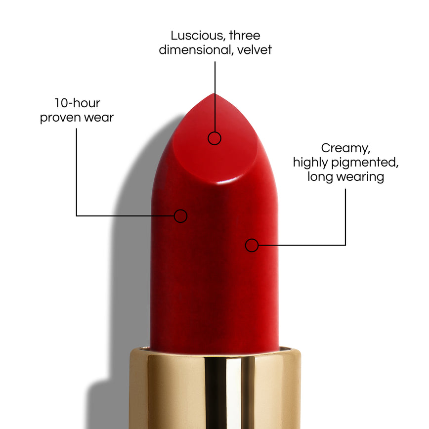 True Velvet Lip Colour bullet close-up, with text demonstrating it's benefits: Lucious, three dimensional, velvet. 10-hour proven wear. Creamy, highly pigmented, long wearing. In shade Ribbon.
