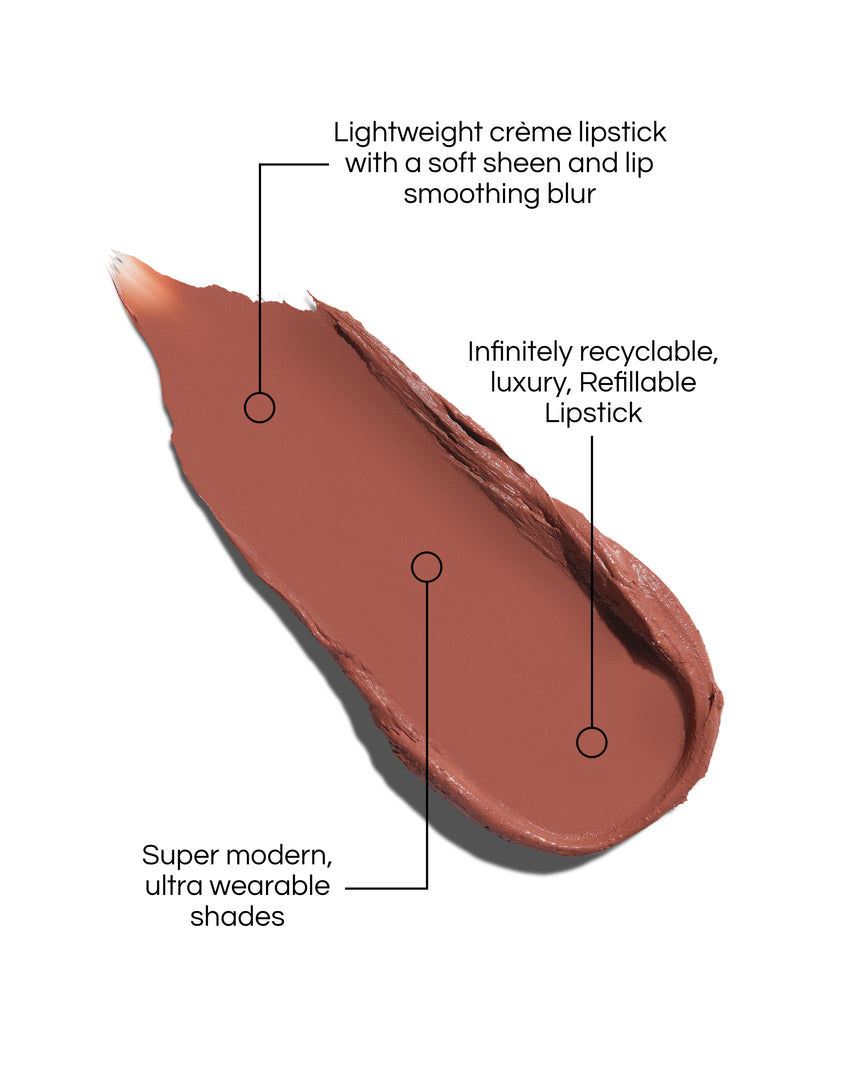 Rouge Experience Lipstick swatch with text describing features on a white background, in shade Simone. Text reads: Lightweight creme lipstick with a soft sheen and lip smoothing blur. Infinitely recyclable, luxury, Refillable Lipstick. Super modern, ultra wearable shades.