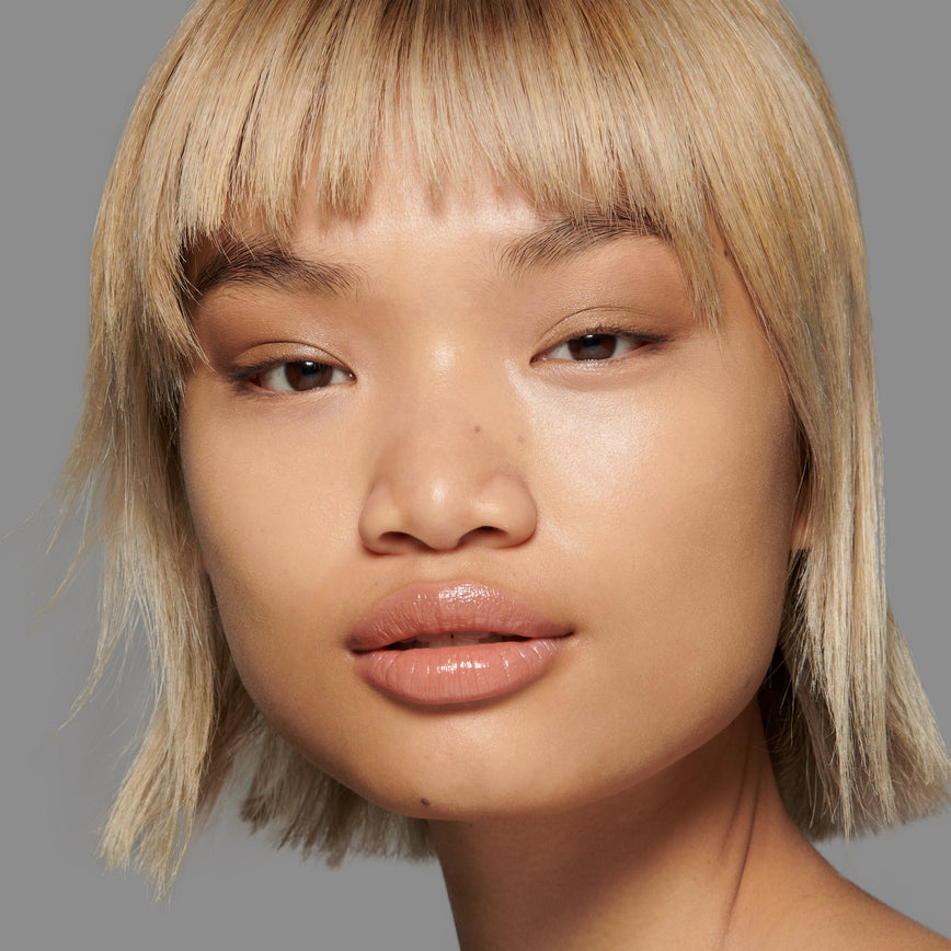 Lisa Eldridge Seamless Skin Foundation Pictured on Model. The model has light/medium skin and neutral golden undertones, brown eyes and straight blonde hair.