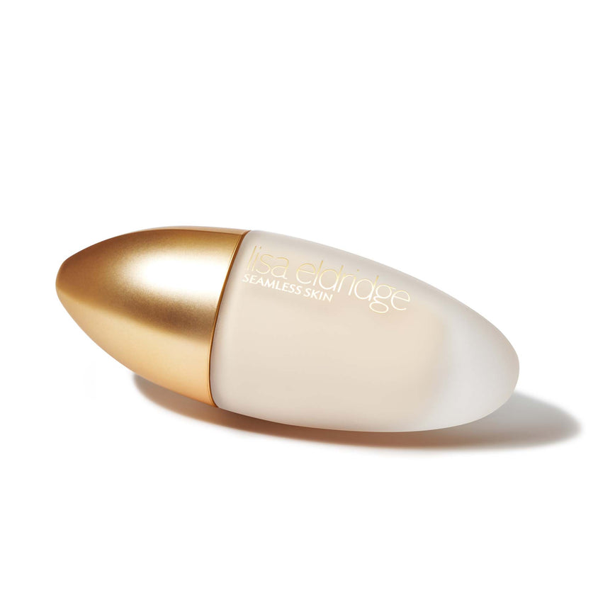Lisa Eldridge Seamless Skin Foundation in a matte glass bottle with a gold lid.