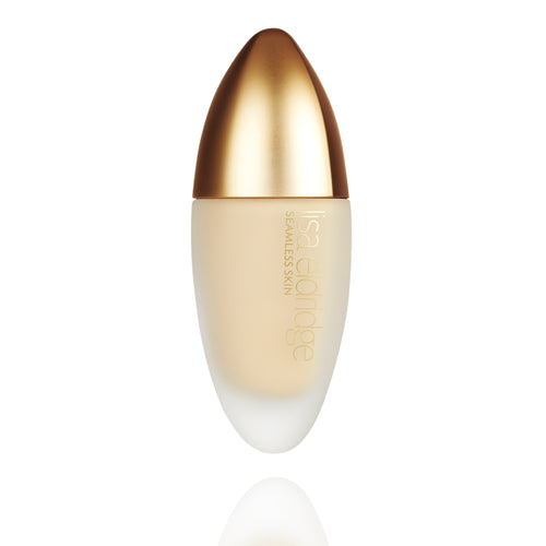 Lisa Eldridge Seamless Skin Foundation in a matte glass bottle with a gold lid. The bottle says ‘lisa eldridge SEAMLESS SKIN’