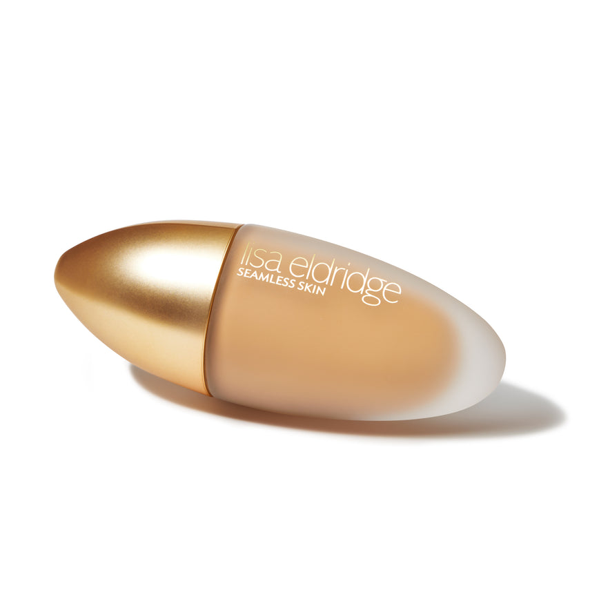 Lisa Eldridge Seamless Skin Foundation in a matte glass bottle with a gold lid.