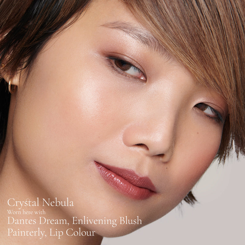 Model wearing Crystal Nebula Elevated Glow Highlighter