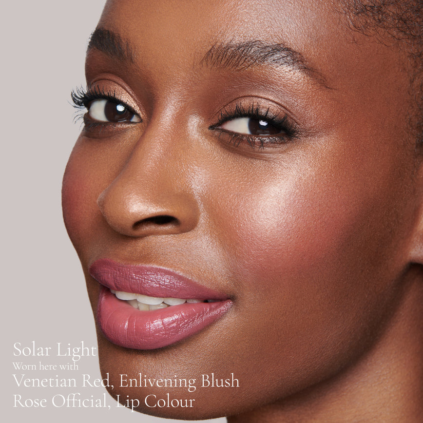 Lisa Eldridge Elevated Glow Highlighter in Shade Solar Light Pictured on Model
